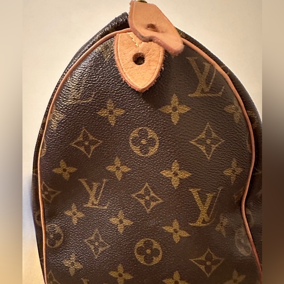 Louis Vuitton
Speedy 30 bag
2013 Collection - Picture 3 of 7